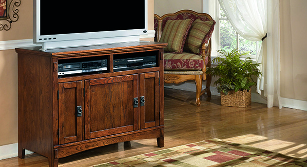 Ashley Furniture medium brown cross island tv stand 